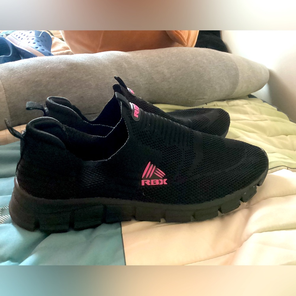 RBX slip on athletic sneaker size 10. Black mesh with hot pink details